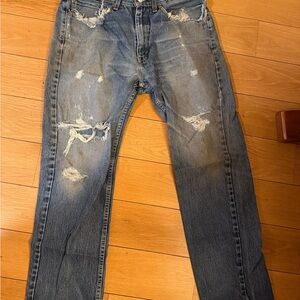 Levi's 505 blue distressed jeans